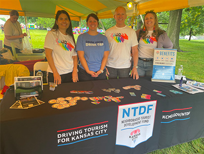 NTDF staff at outdoor booth promoting tourism in Kansas City