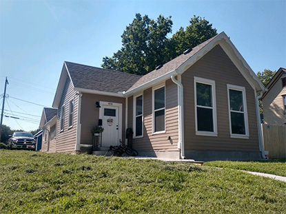 new family home - brown with white trim