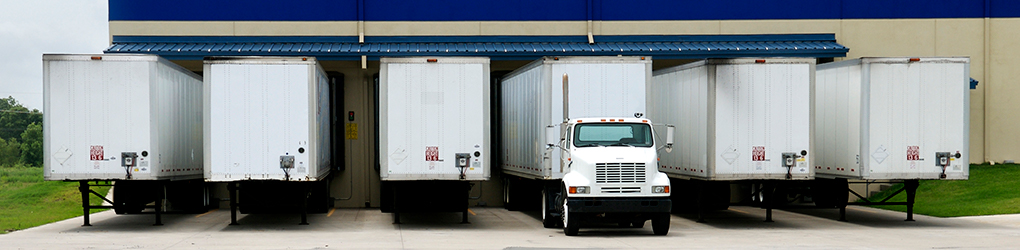 wholesaler trucks in a truck bay