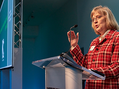 Sherri McIntyre speaking at a conference