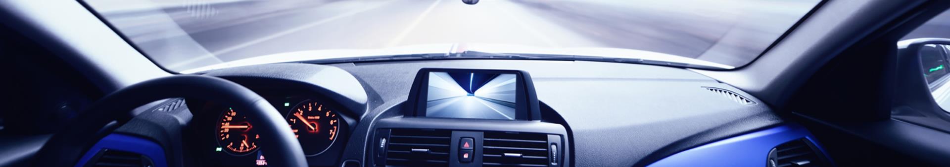 Interior view of car dashboard and windshield