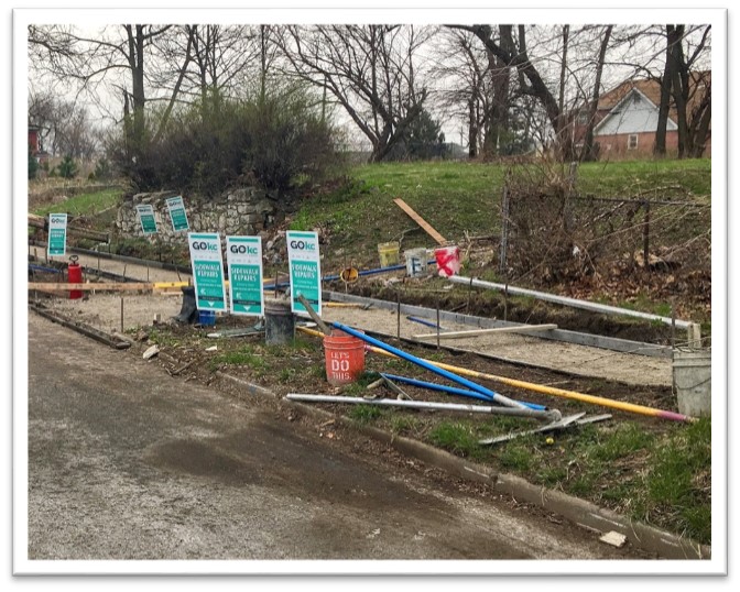 sidewalk and GO bond signs