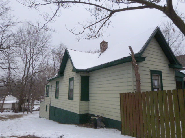 Exterior photo of front/side of house located at 2513 Spruce.