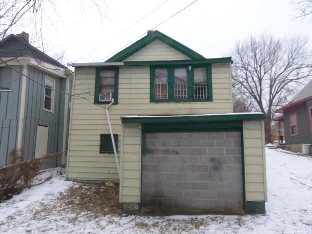 Exterior photo of rear of house located at 2513 Spruce.