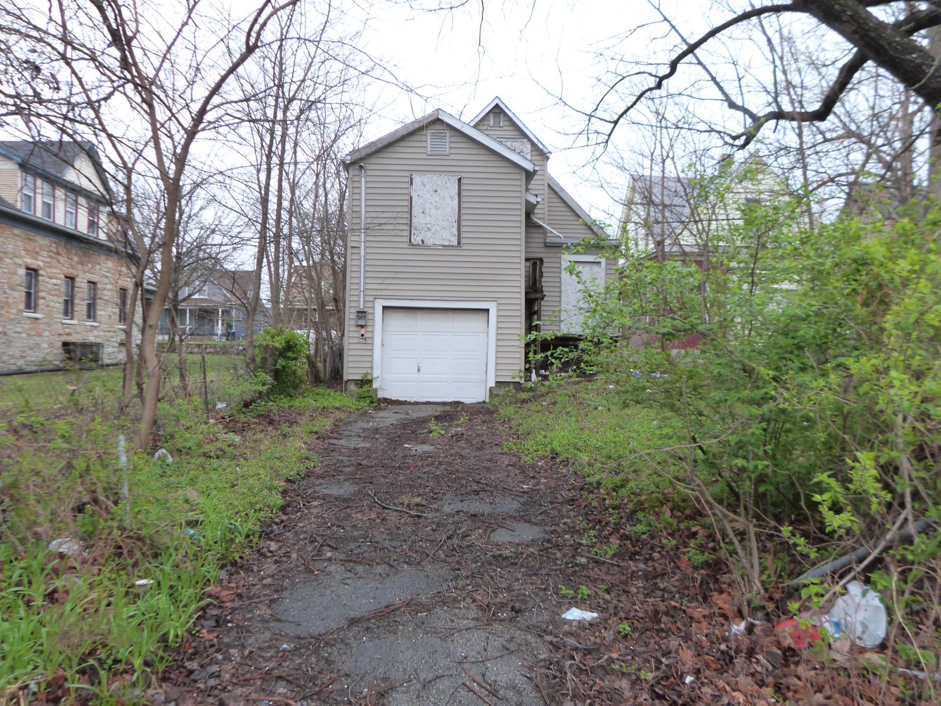 Exterior photo of rear of house located at 3011 Montgall.