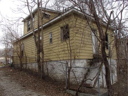 Exterior photo of side/back of house located at 3012 Cleveland.