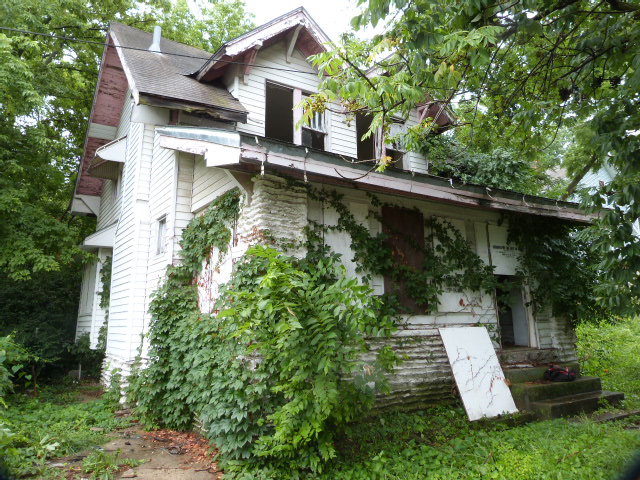 Exterior photo of front/side of house located at 3211 E 33rd st.