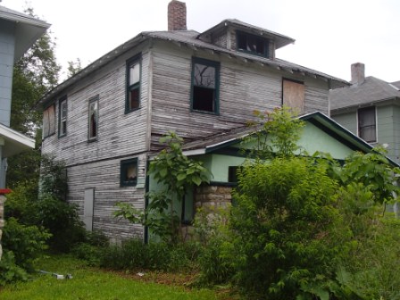 Exterior photo of front/side of house located at 3205 College.