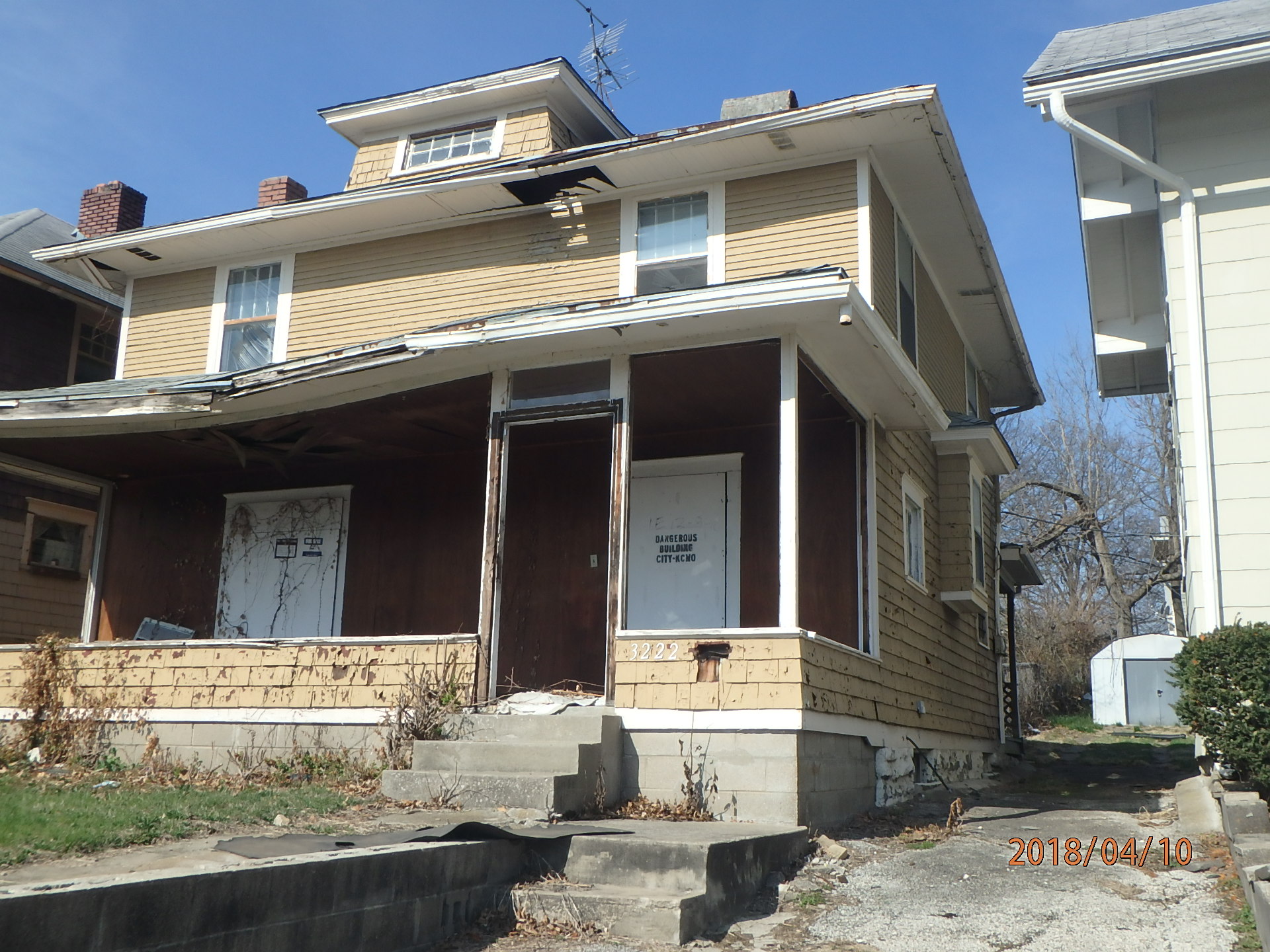 Exterior phot of front/side of house located at 3222 College.