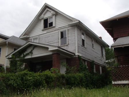 Exterior photo of front/side of house located at 3228 College.