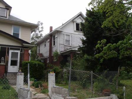 Exterior photo of front/side of house located at 3228 College.