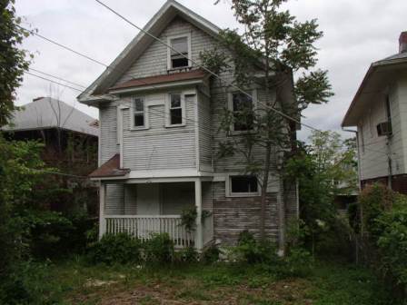 Exterior phot of back side of house located at 3228 College.