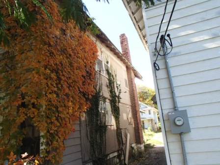 Exterior photo of side of house located at 3331 College.