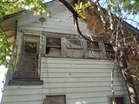 Exterior phot of back side of house located at 3331 College.