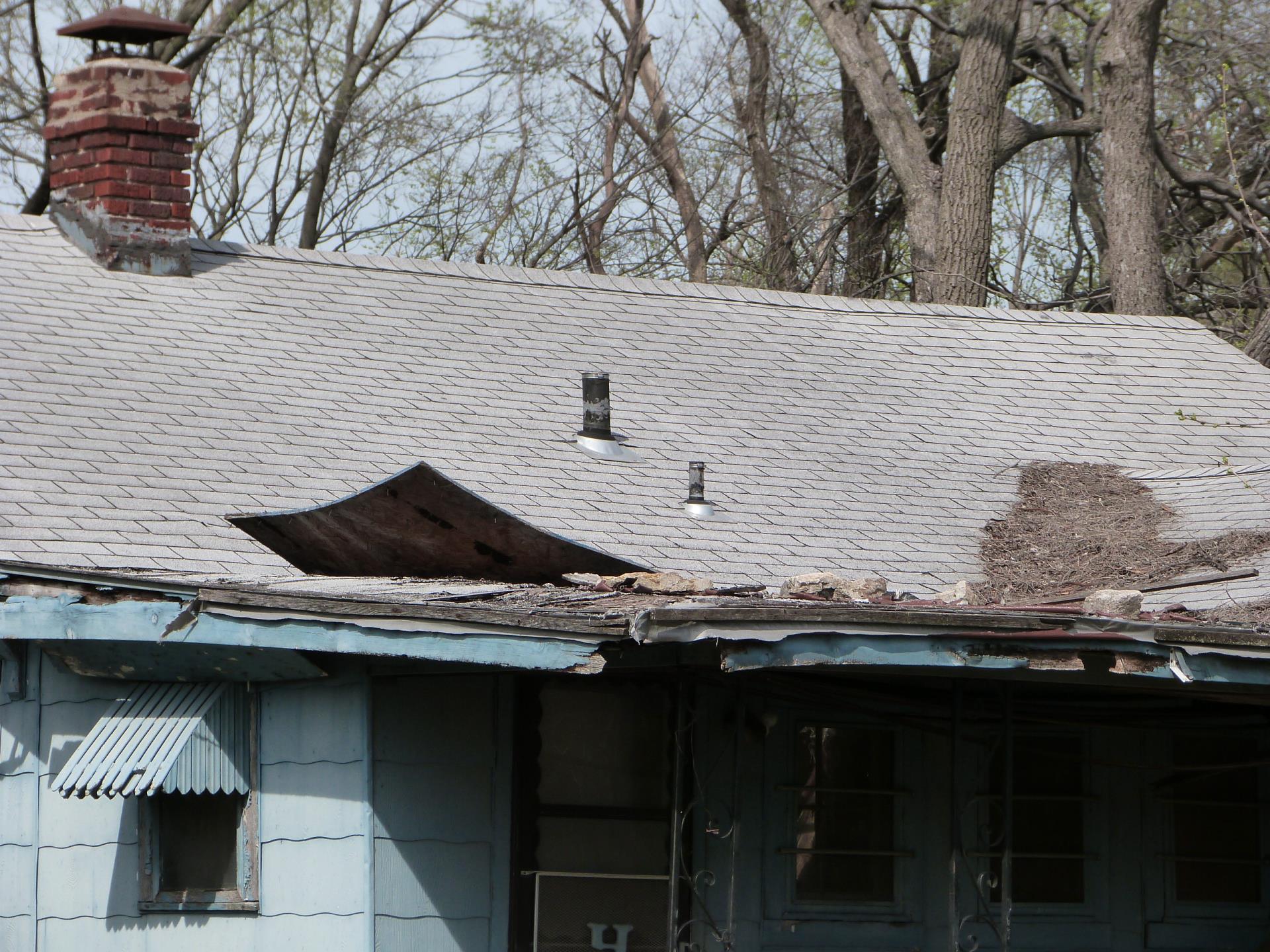 Exterior photo of back side of house located at 6301 E 35th Ter.