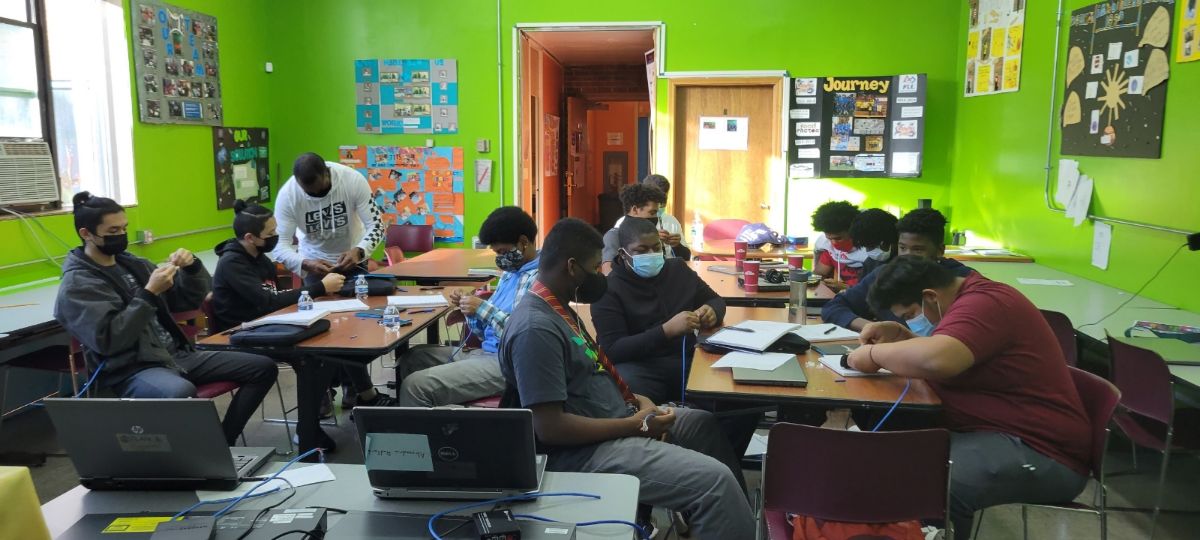 properly masked children learning in a classroom