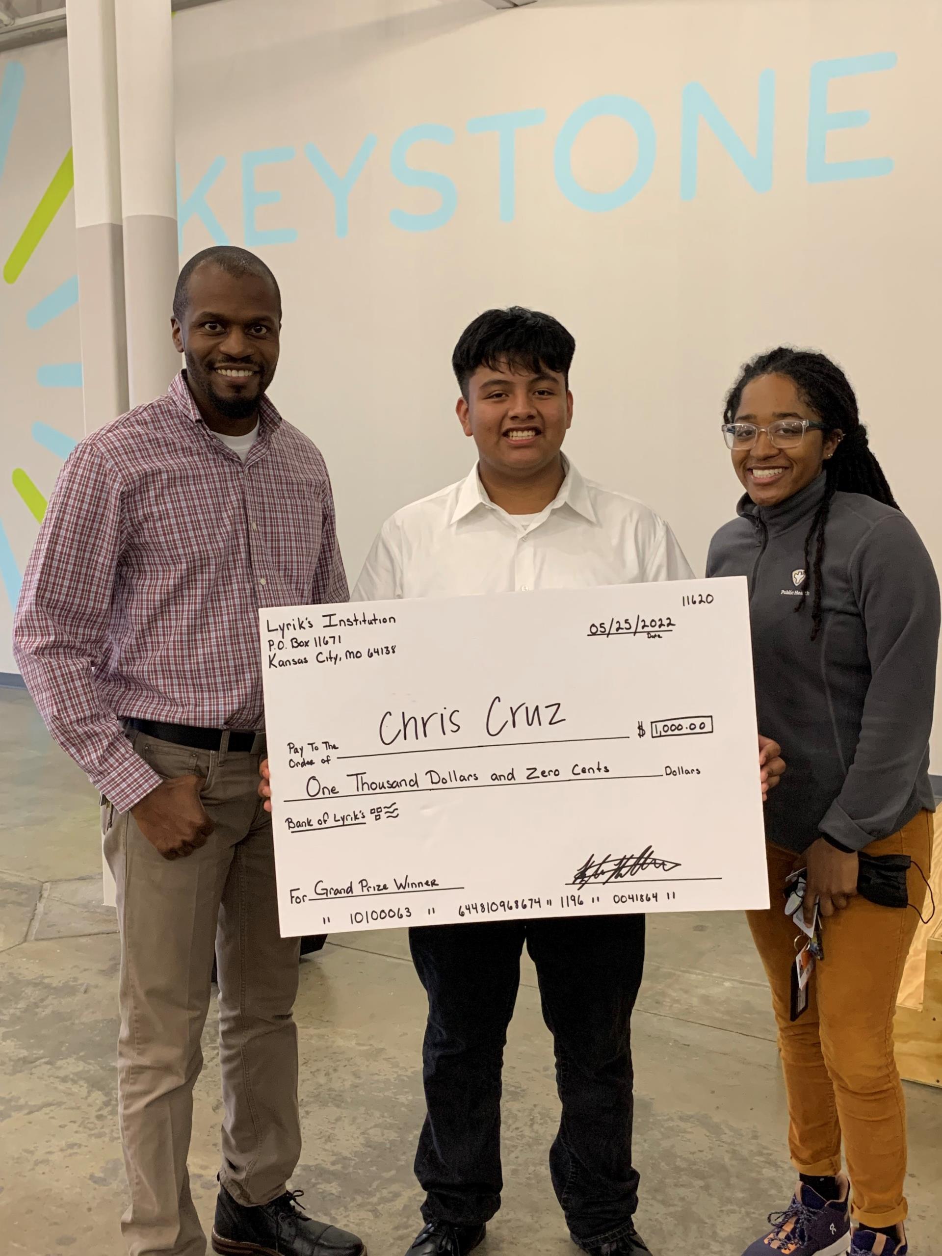 Chris Cruz won $1000 in a Power Moves KC Shark Tank contest funded by Aim4Peace