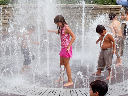 kids playing at a sprayground