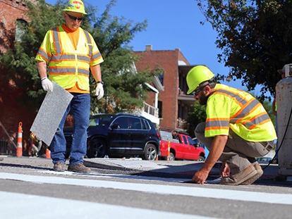 KCMO City staff working on street